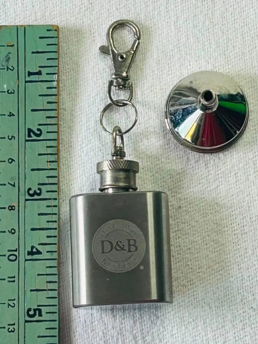 Dave & Busters 1 OZ Stainless Steel Keychain Flask with Funnel Never Used NWOT